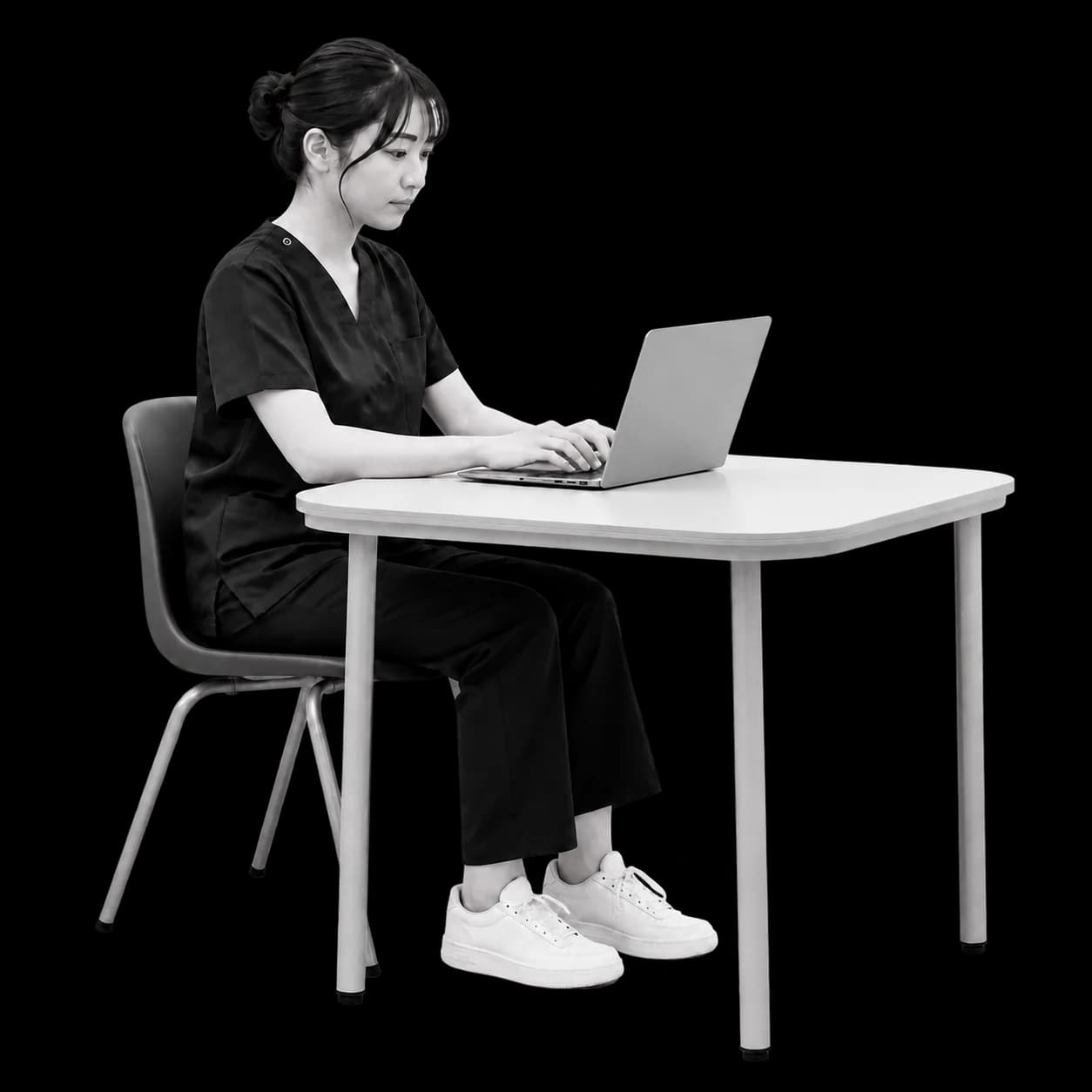 リハビリ職から参加したメンバーがパソコンで作業するイメージ